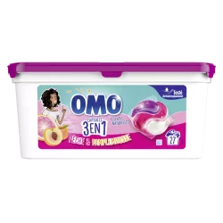 Omo Lessive Capsules 3en1 Pêche & Pamplemousse aux essences naturelles et testé dermatologiquement. 