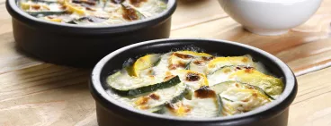 Gatin aux courgettes, chèvre et miel Maizena®