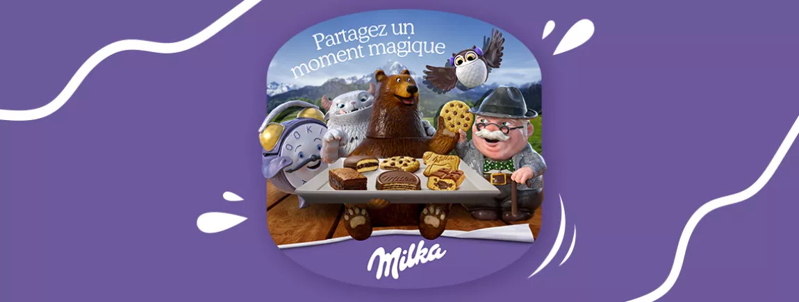 Un père et sa fille partagent un goûter avec Milka biscuits