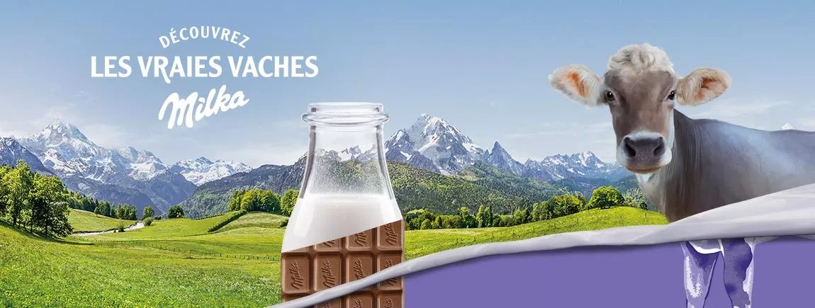 Les vraies vaches Milka®Choco, les stars de vos tablettes Une vache, une bouteille de lait et une tablette de chocolat dans un décor Alpin